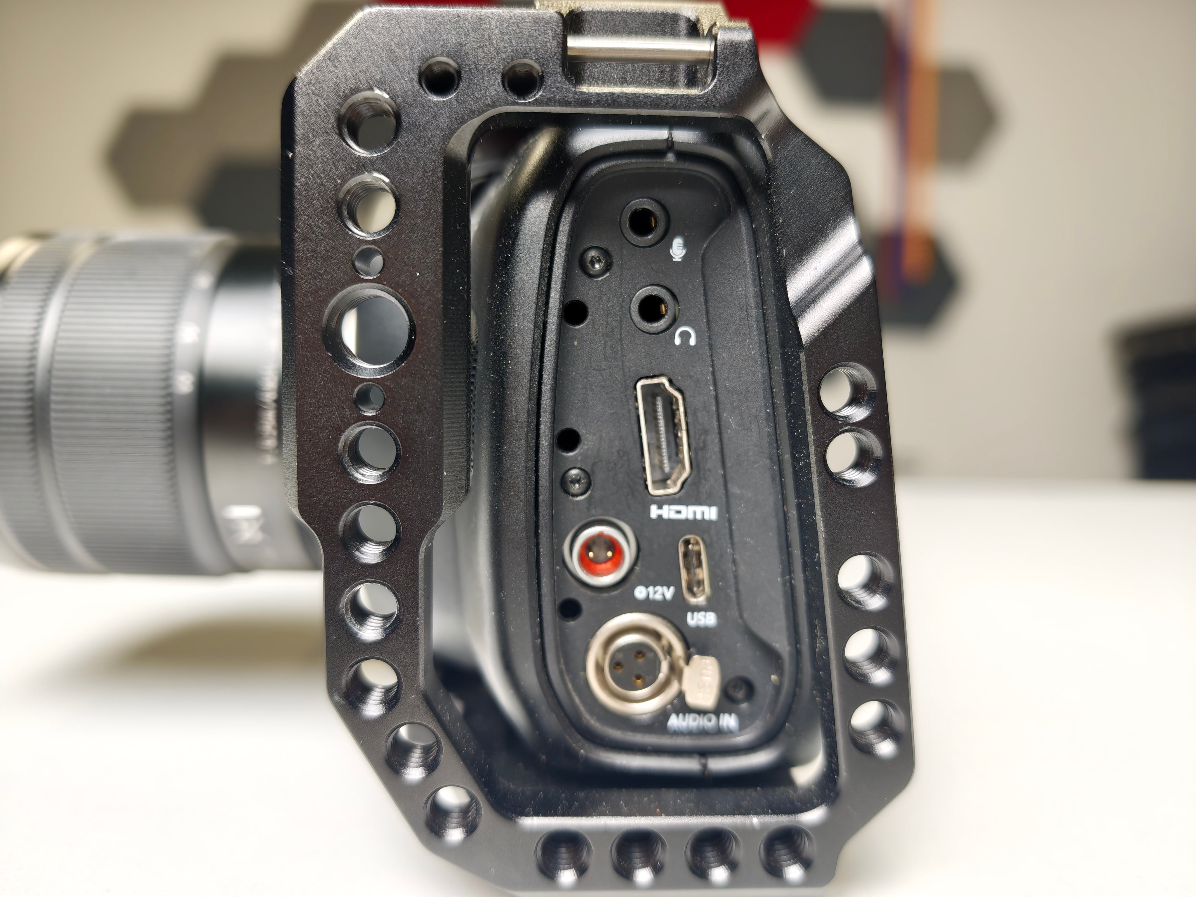 Second hand Blackmagic Pocket Cinema Camera 4K + Lumix G Vario Lens, 12-60mm f3.5-5.6 ASPH. MFT POWER O.I.S. + cage